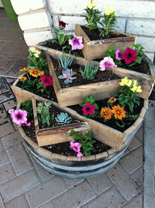 Maceteros inteligentes con madera para cultivar muchas plantas en tu jardín