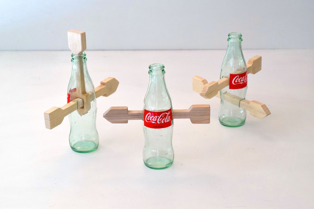 Arrow Through a Coca-Cola Bottle; Three Variations