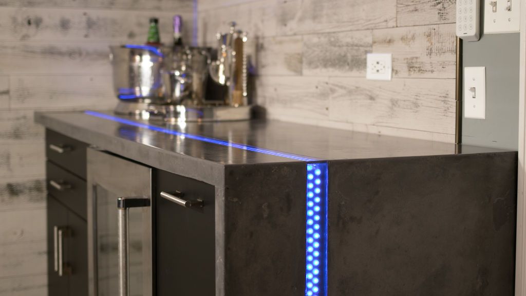 Encimera de Hormigón Tipo Cascada con Instalación de Luces LED