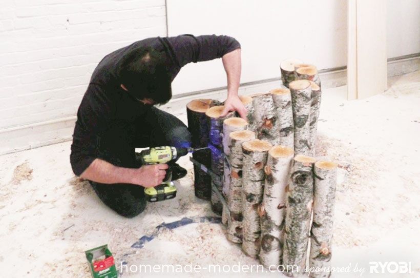 Moderna Tumbona of Recycled Logs
