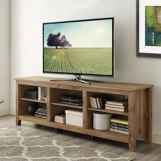 15 elegantes muebles de madera para montar tu televisor