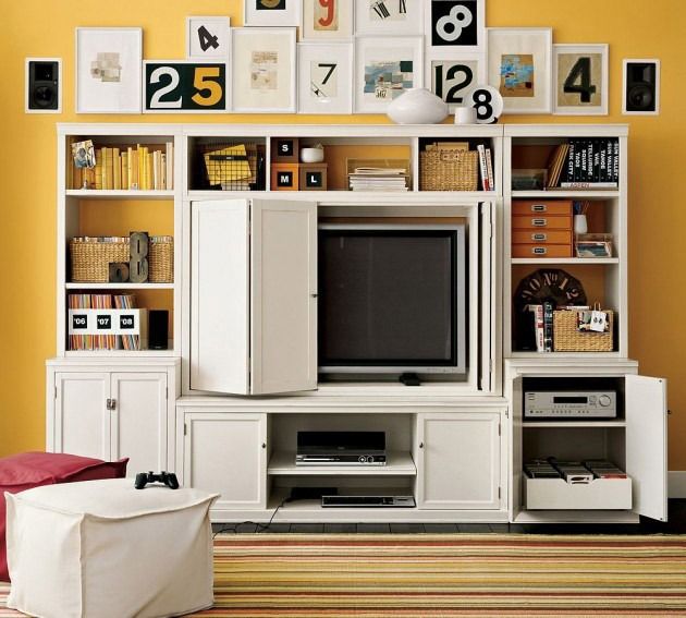 Mira los siguientes muebles que mantendrán tu TV oculta y ahorrarán espacio