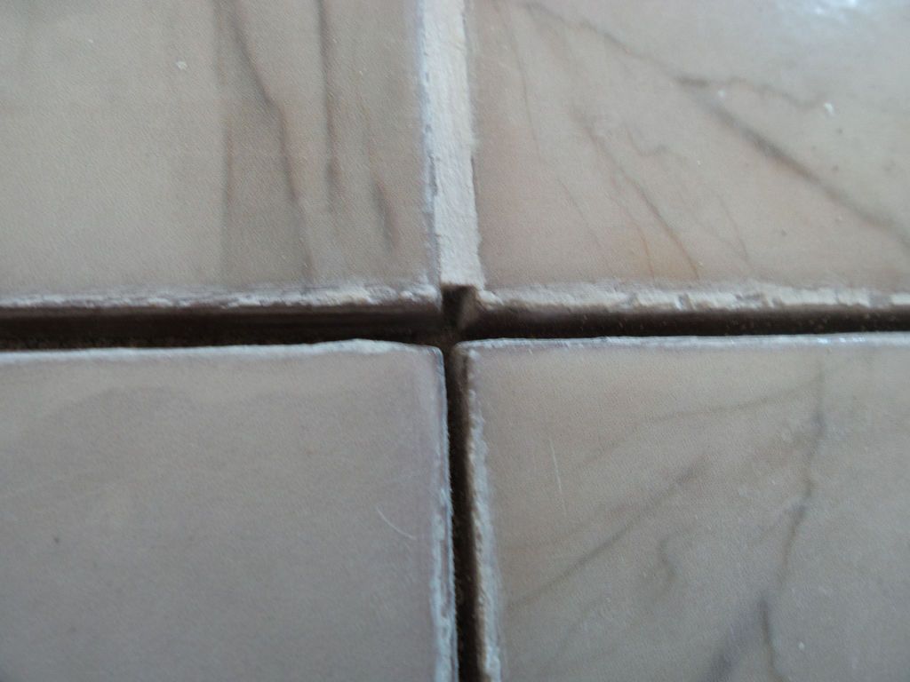 How to Fix Loose Living Room Tiles