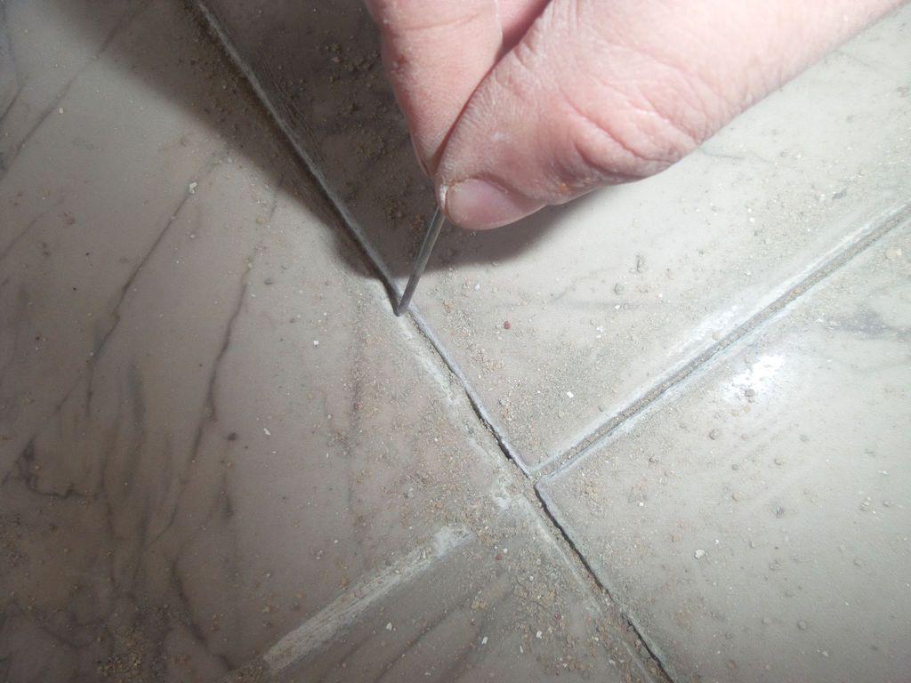 How to Fix Loose Living Room Tiles