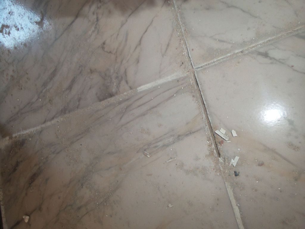 How to Fix Loose Living Room Tiles