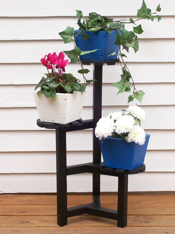 Soportes de madera para tus plantas